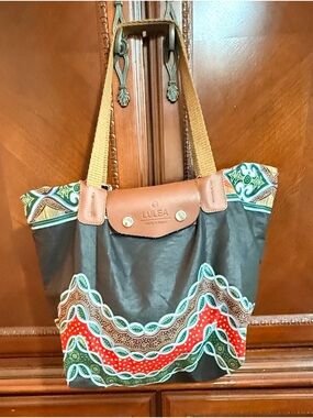 Lulea NWOT Made in Kenya
Leather Globally inspired
Foldable Tote boho/hobo vibes